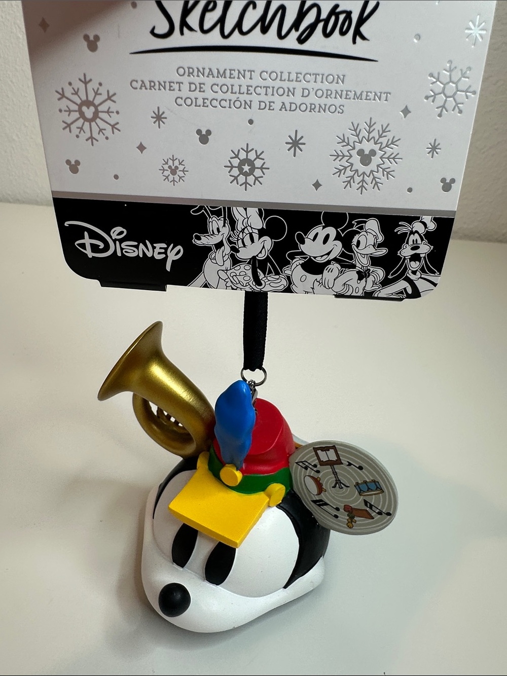 Disney White Mickey Head Ornament with Gold Horn and Red, Blue, Yellow Accents